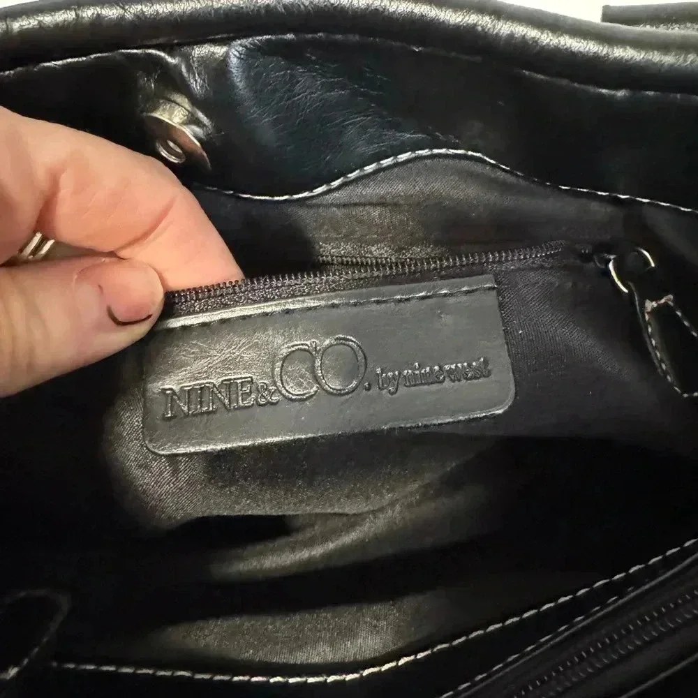 Nine  and Co  black leathe purse